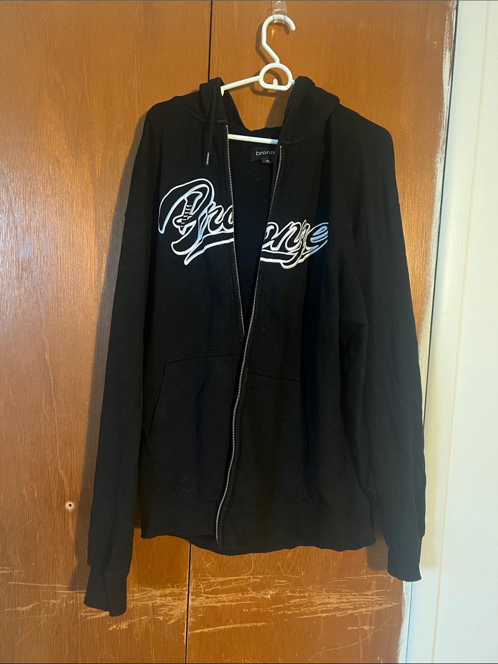 Bronze 56k zip up. 

Washed in cold water/air dried. Worn twice.